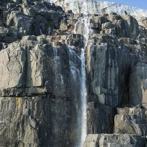 Waterfall in a glacier on Alkefjellet