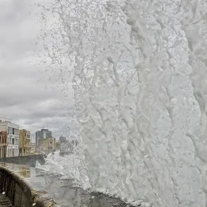 Wave jumping pier, rain and wind, Havana, Cuba Wave jumping pier, rain and wind, Havana, Cuba