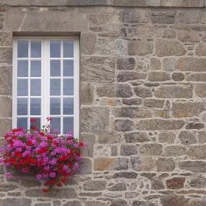 White mullioned window in a historic house