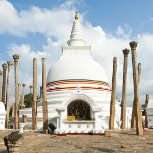 White Stupa, colorful ribbon in the colors of Buddhism