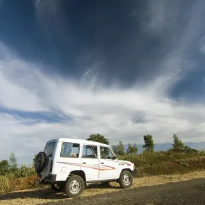 White sumo car under dramatic sky at Chikhaldara White sumo car under dramatic sky at Chikhaldara