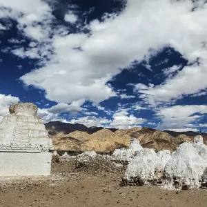 Whitewashed chortens (Tibetan Buddhist stupas)