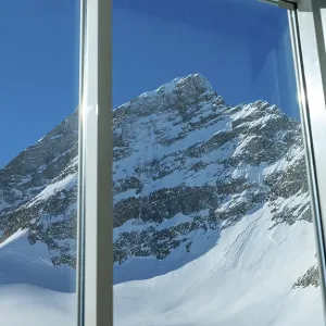 Window View over Beautiful Mountain Peak Jungfrau 4158 Meters High