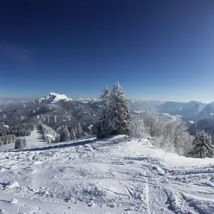 Winter landscape with ski tracks in deep snow