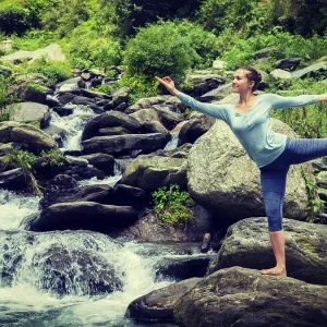 Woman doing yoga asana Natarajasana Woman doing yoga asana Natarajasana