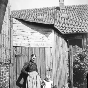 Woman and little girl posing for photo Woman and little girl posing for photo