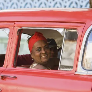 Woman looking out of a car window