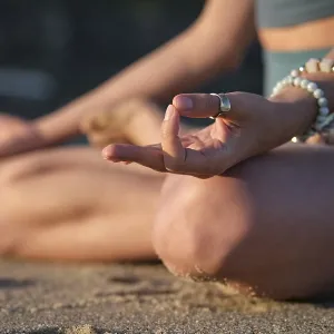 Woman Meditates in Padmasana on the Beach Print