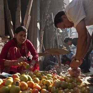 Woman selling vegetables in the streets of Kathmandu Woman selling vegetables in the streets of Kathmandu