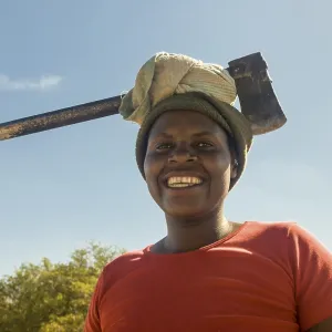Woman wearing ax on her head, Thohoyandou Woman wearing ax on her head, Thohoyandou