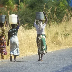 Women balancing baskets on their heads Women balancing baskets on their heads