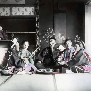 Four women and man making music, Japan, Asia