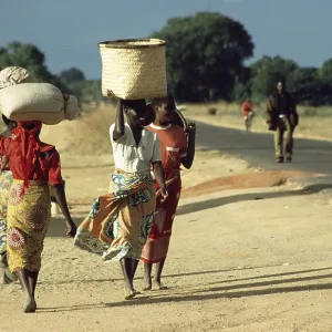 Women with payloads, Malawi, Africa