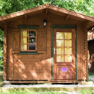 Wooden bungalows on campsite camping. Green trees Wooden bungalows on campsite camping. Green trees