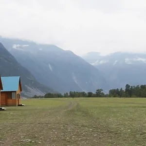 Wooden camping cabins near mountains Wooden camping cabins near mountains