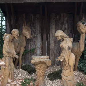 Wooden crib with religious figures and animals