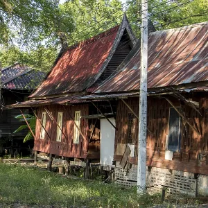 Wooden houses in the areal Buddhist monastery Wat Phai Rong Wua