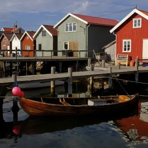 Wooden houses, landing stage, fishing village on the small archipelago island of Resoe