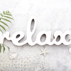 Word relax and sea shells, summer holidays concept flat lay
