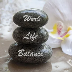 Work life balance text engraved on stones