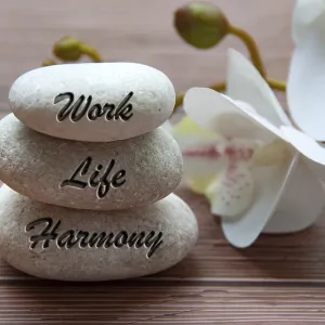 Work life harmony text engraved on stones