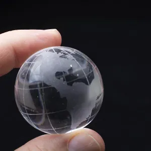 World globe crystal glass in hand