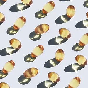 Yellow omega 3 capsule pattern