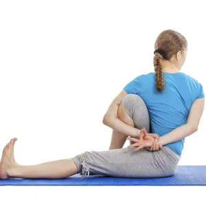 Yoga, young beautiful slender woman yoga instructor doing Forward Bends Sage Twist C pose (Marichyasana C) Yoga, young beautiful slender woman yoga instructor doing Forward Bends Sage Twist C pose (Marichyasana C)