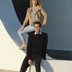 A young couple enjoys a sunny day in an urban area