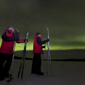 Young couple, woman and man, cross country skiing Young couple, woman and man, cross country skiing