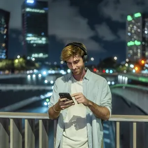 Young Man on City Bridge Nighttime Print
