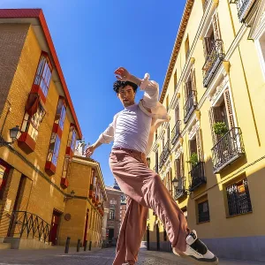 Young Man Dancer in Vibrant Urban Setting Print