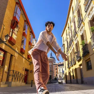 Young Man Dancing on Madrid Cobblestones Print
