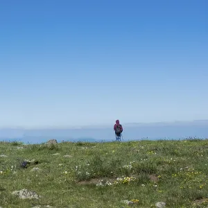 Young man taking an excursion on a mountain Young man taking an excursion on a mountain
