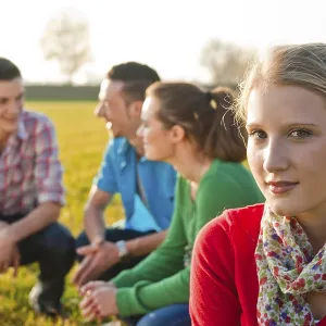 Young people on a walk in natural surroundings