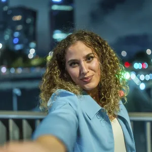 Young Woman with Curly Hair at Night Print
