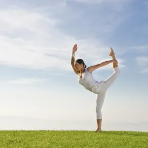 Young woman practising Hatha yoga outdoors Young woman practising Hatha yoga outdoors