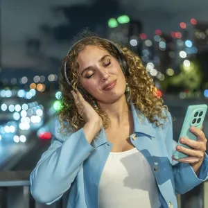 Young Woman Relaxing on a City Bridge Print