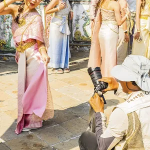 Young woman in traditional clothing presents herself to photographers Young woman in traditional clothing presents herself to photographers