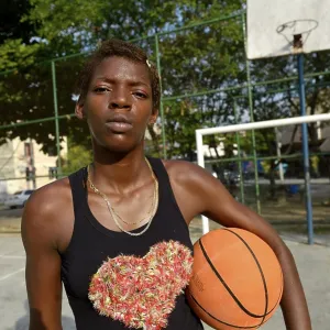 Youth, 15, with a basketball, Rio de Janeiro Youth, 15, with a basketball, Rio de Janeiro