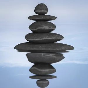 Zen stones balance concept isolated on white Zen stones balance concept isolated on white