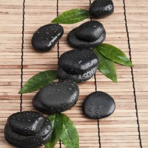 Zen stones and leaves with water drops Zen stones and leaves with water drops