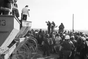 About 100, 000 demonstrators, peaceful and violent