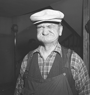 In the 1940s. The elderly man has a white cap on his head and makes a funny face. Sweden 1947. ref AA46-3