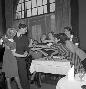 In the 1940s. Seven young women but only one man
