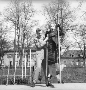 1950s couple. Actress AnnaLisa Ericson is training to learn how to walk and balance on stilts