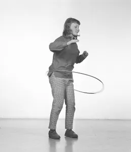 In the 1950s. A girl Hula hooping