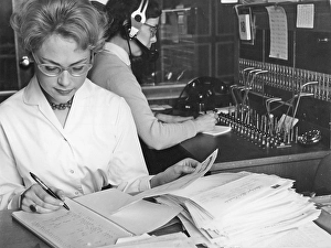 1950s office clerk and telephone switchboard operator