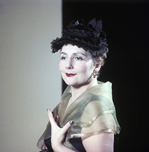 In the 1950s. Portrait of a woman wearing a fashionable hat and a colorful make-up