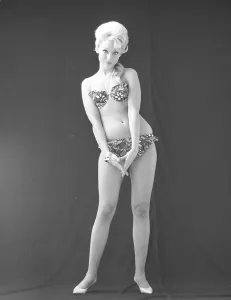 1960s bikini fashion. A blonde girl in a photographers studio in a typical 1960s bikini. Sweden 1960s Photo Kristoffersson ref CP58-12